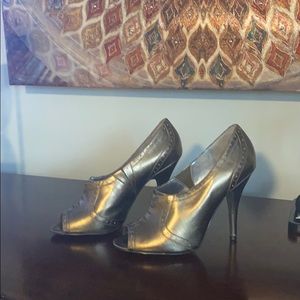 Bronze color gently used peep toe heels.